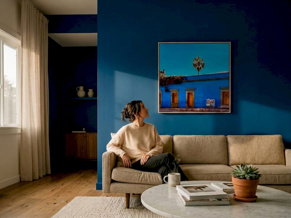 Large statement art above sofa in living room