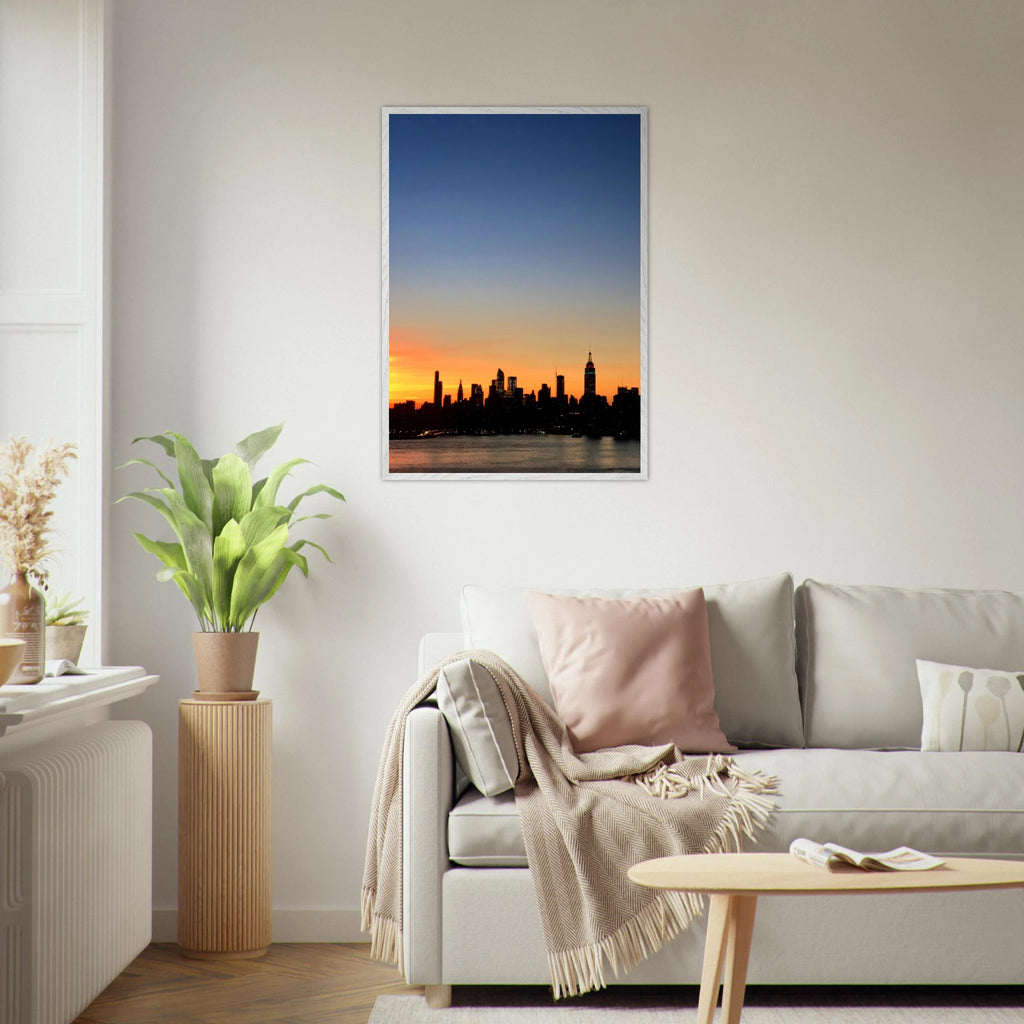 Premium wooden framed Manhattan skyline sunset poster, travel-themed wall art with vibrant cityscape and warm sunset hues.