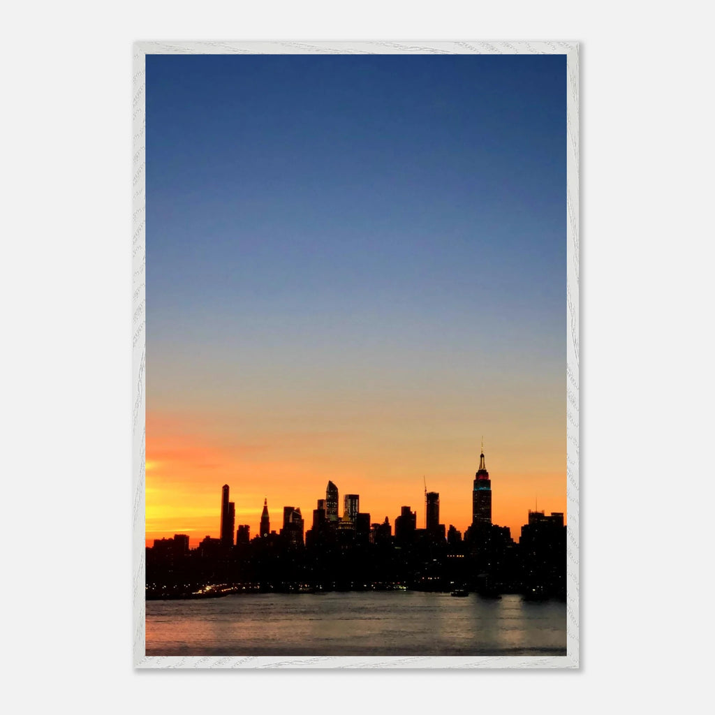Manhattan skyline sunset framed poster featuring NYC wall art with vibrant colors and cityscape detail, printed on high-quality material.