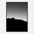 Black and white semi-glossy poster print featuring a fall moon over Hollywood Hills in California, with a wooden frame and studio edition style.