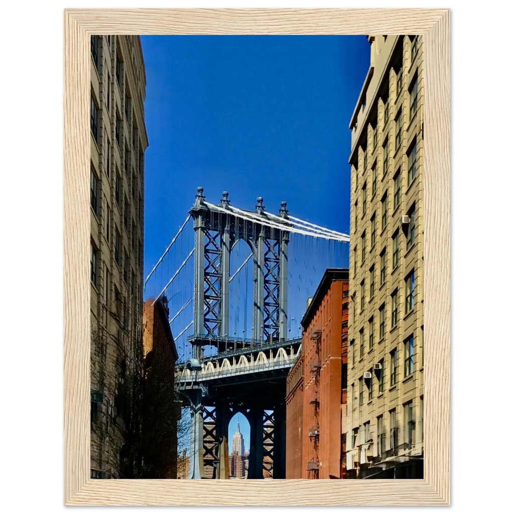 Framed print of NYC DUMBO skyline Brooklyn wall art by CaliCuration, showcasing vibrant cityscape and iconic Brooklyn Bridge.