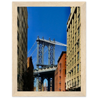 Framed print of NYC DUMBO skyline Brooklyn wall art by CaliCuration, showcasing vibrant cityscape and iconic Brooklyn Bridge.