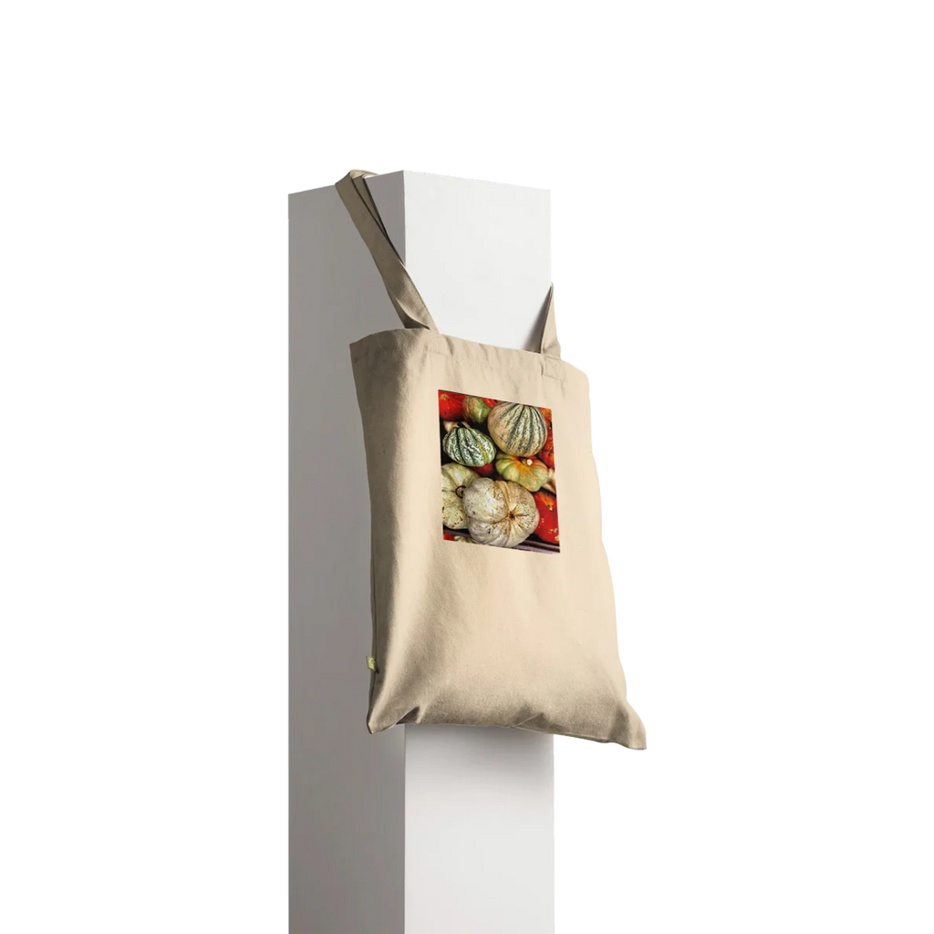 Rustic autumn harvest tote bag with pumpkin and gourd print, made from durable material, perfect for farmhouse market style.