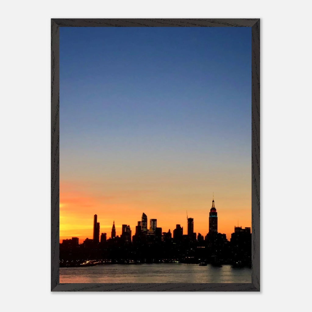 Sunset Manhattan skyline framed poster showcasing NYC cityscape wall art on high-quality print material.