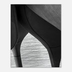Black and white abstract canvas print of NYC Hudson River pier with high heels in water, part of the Studio Edition Travel Collection.
