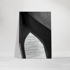 Black and white abstract canvas print featuring high heels in water at NYC Hudson River Pier, part of the Travel Collection.