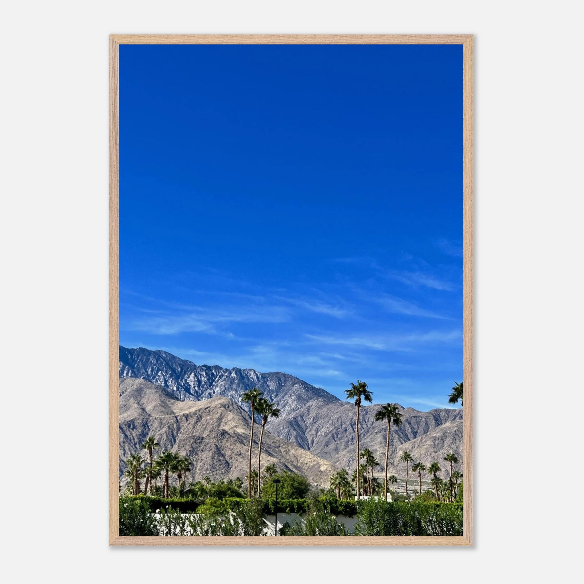 Wooden framed poster of a sunny fall day in Palm Springs, California, featuring vibrant autumn scenery and studio-quality print art.