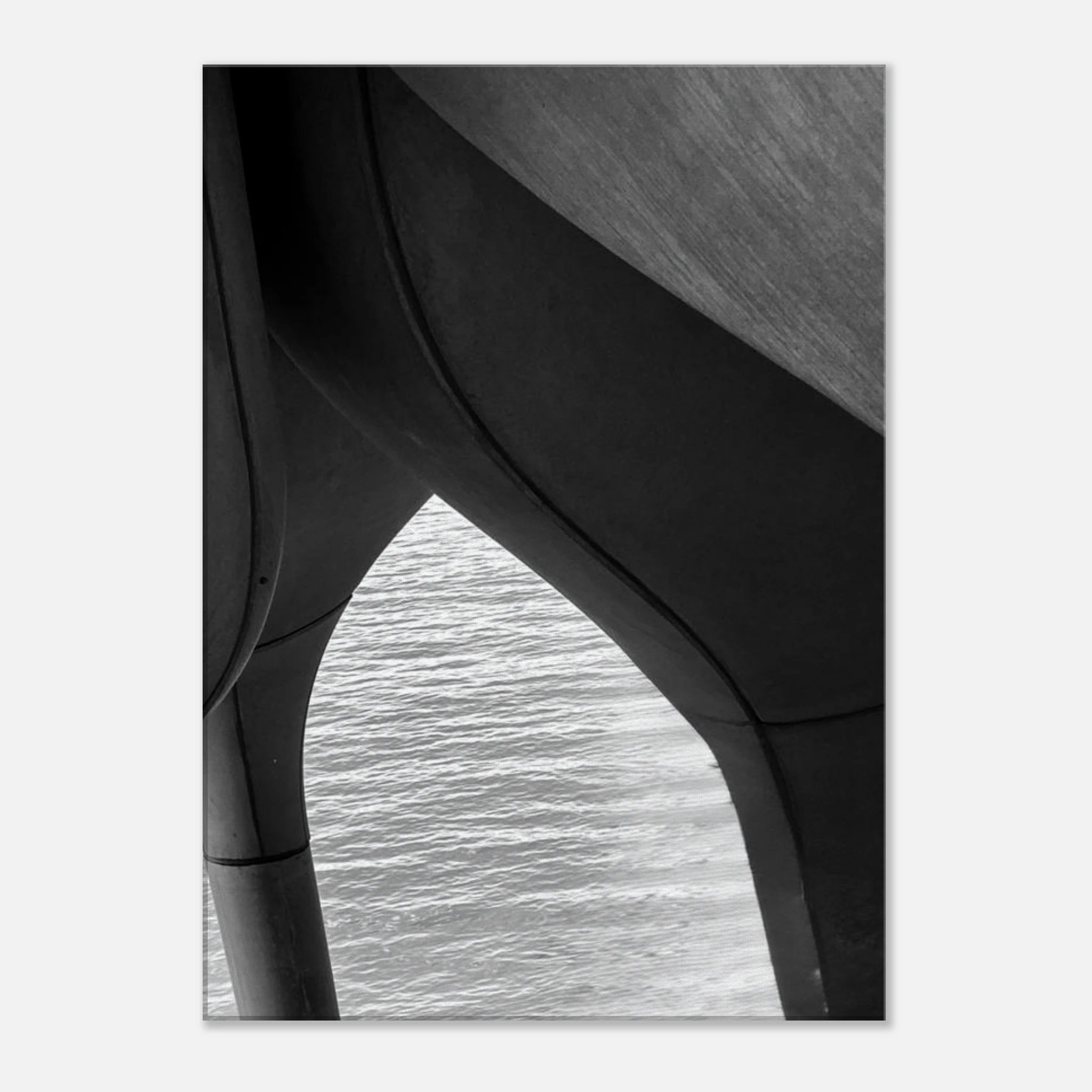 Black and white abstract canvas print of NYC Hudson River pier with high heels in water, part of Studio Edition travel art collection.