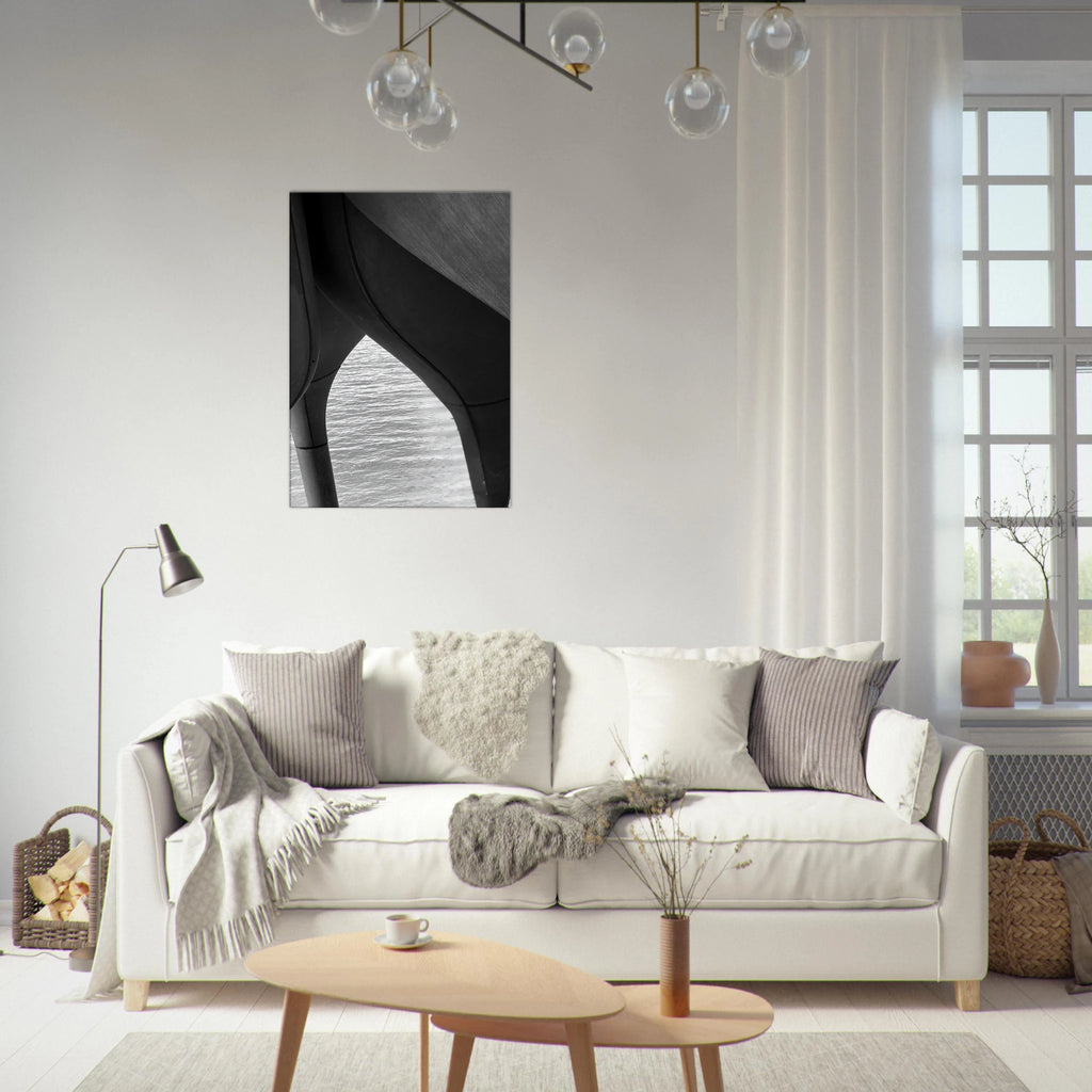 Black and white abstract canvas print of NYC Hudson River pier with high heels in water, part of the Studio Edition Travel Collection.