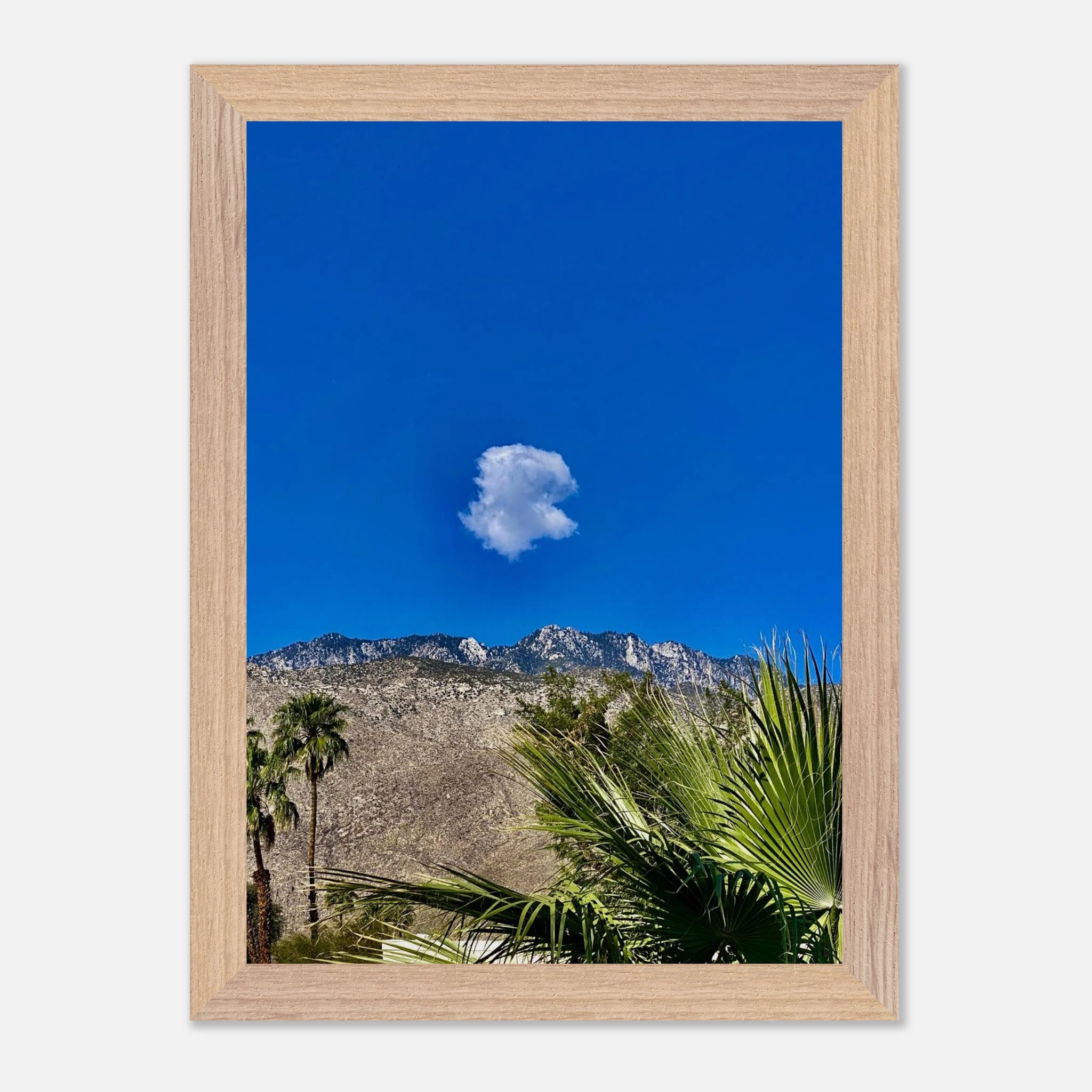 Palm Springs Cloud Mounted Wooden Framed Poster featuring vibrant California art in a stylish home decor setting.