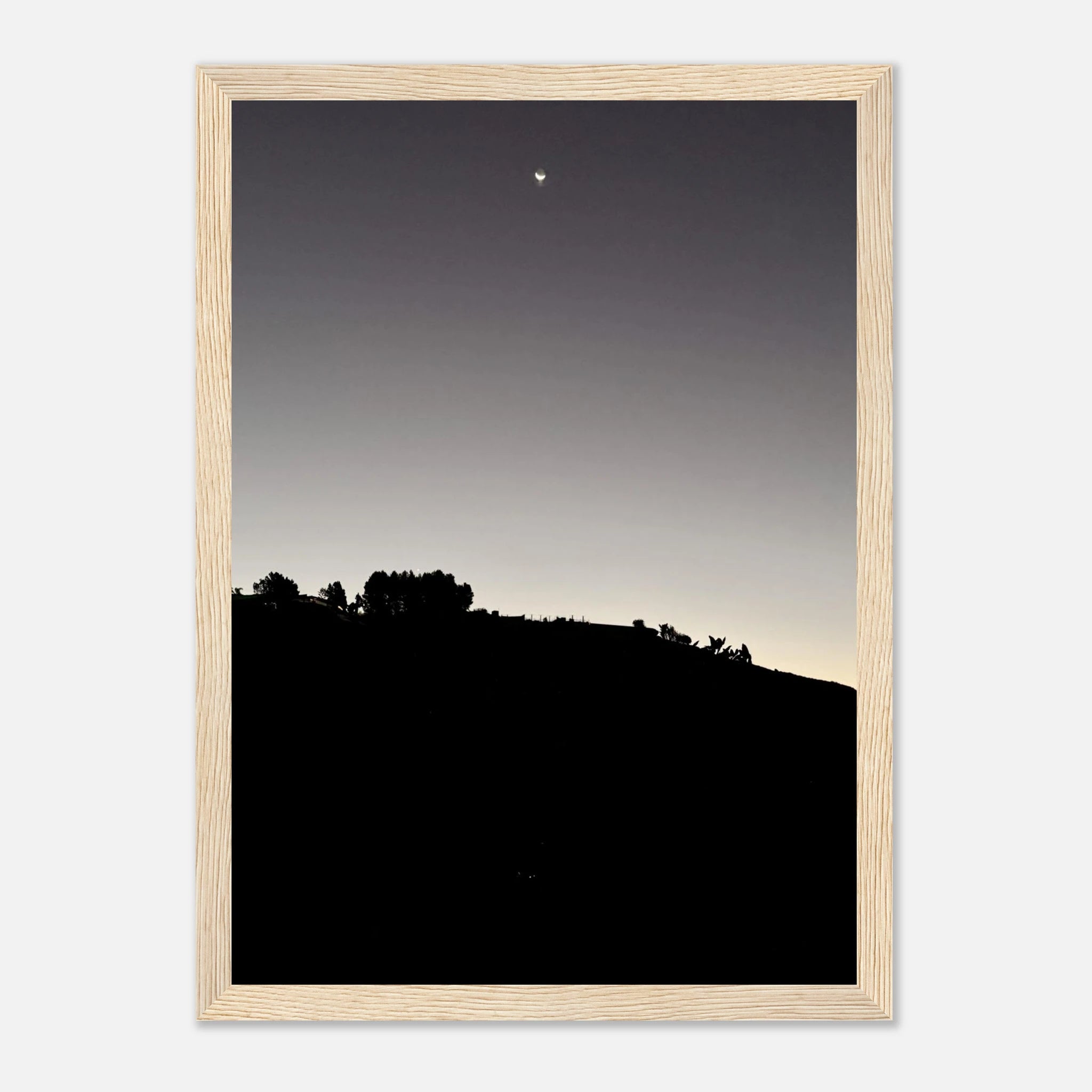 Black and white wooden framed poster featuring a fall moon over Hollywood Hills, part of the California Studio Edition art print series.