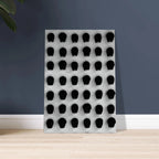 Black and white monochrome skull grid canvas wall art, minimalist statement photography for modern interior decor.