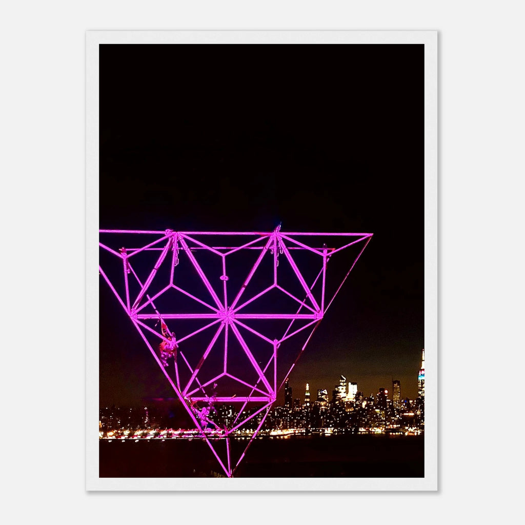 Framed print of New York City holiday art installation featuring a Manhattan night view with Empire State Building, in purple hues.