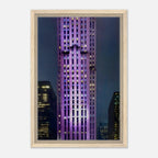 Framed canvas print of NYC holiday skyline in purple hues from the Studio Edition Travel Collection, featuring a vibrant cityscape.
