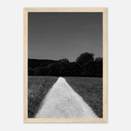 Black and white framed poster of a summer road scene from the Travel Collection, printed on semi-glossy paper, Studio Edition.