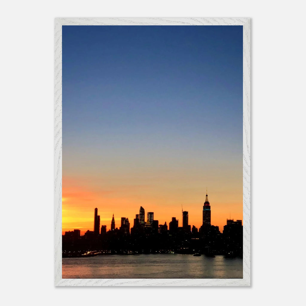 Manhattan skyline sunset framed poster featuring NYC wall art with vibrant cityscape and sunset colors, printed on high-quality material.