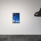 Framed Hawaii travel print featuring iconic palm tree twins and Pacific waves by CaliCuration, styled as a studio edition poster.