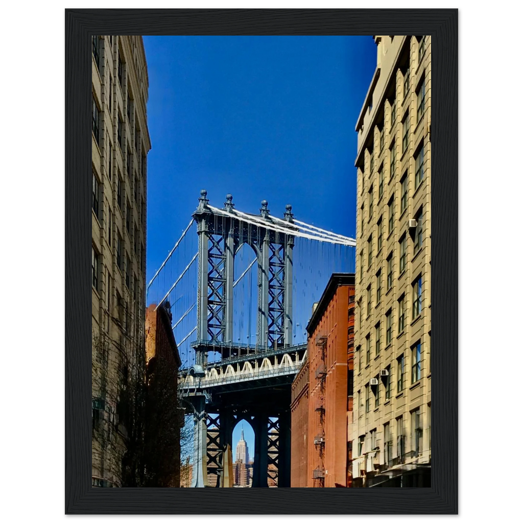 Framed NYC DUMBO skyline print featuring Brooklyn Wall Art by CaliCuration, showcasing a vibrant cityscape in a stylish frame.