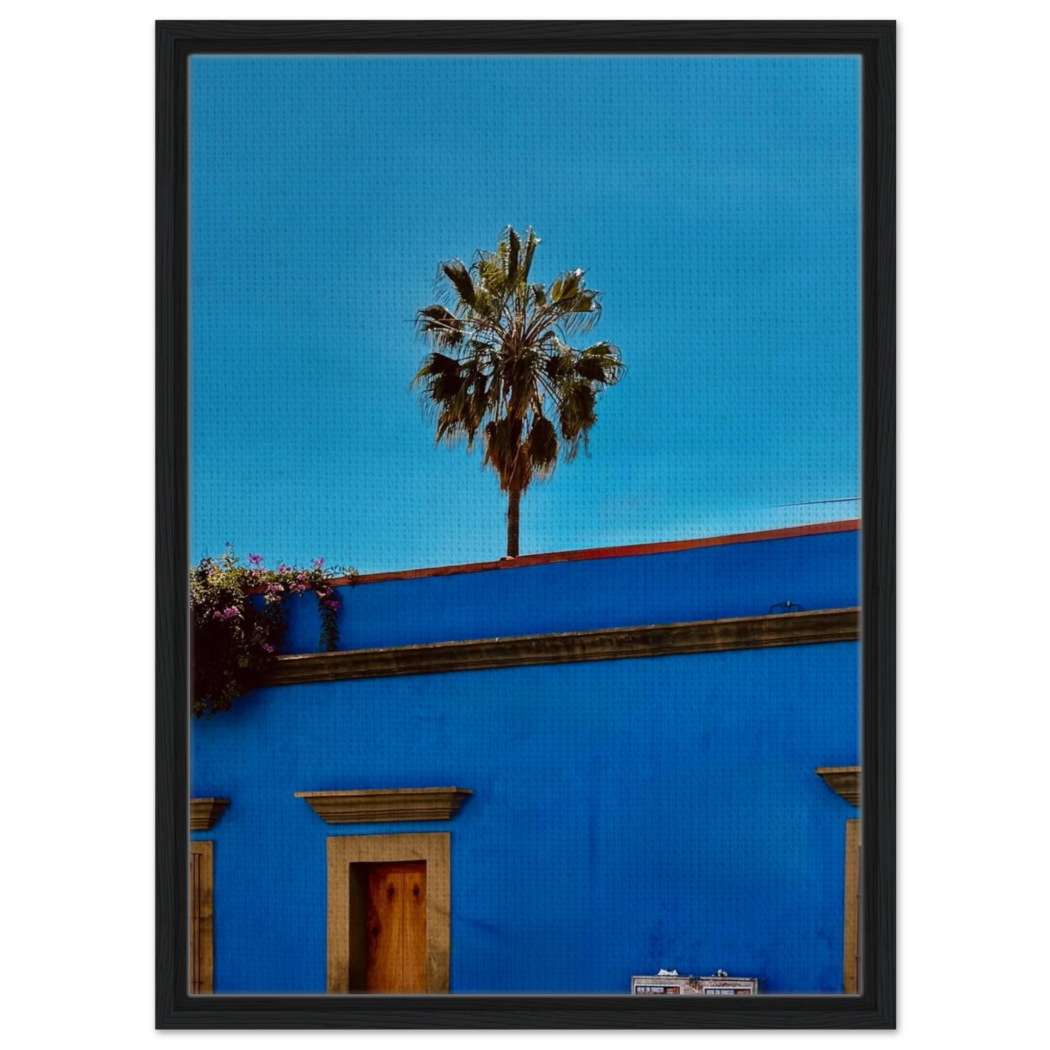 Colorful print of Oaxaca streets with palm trees on blue framed canvas, by CaliCuration from the Mexico travel collection.