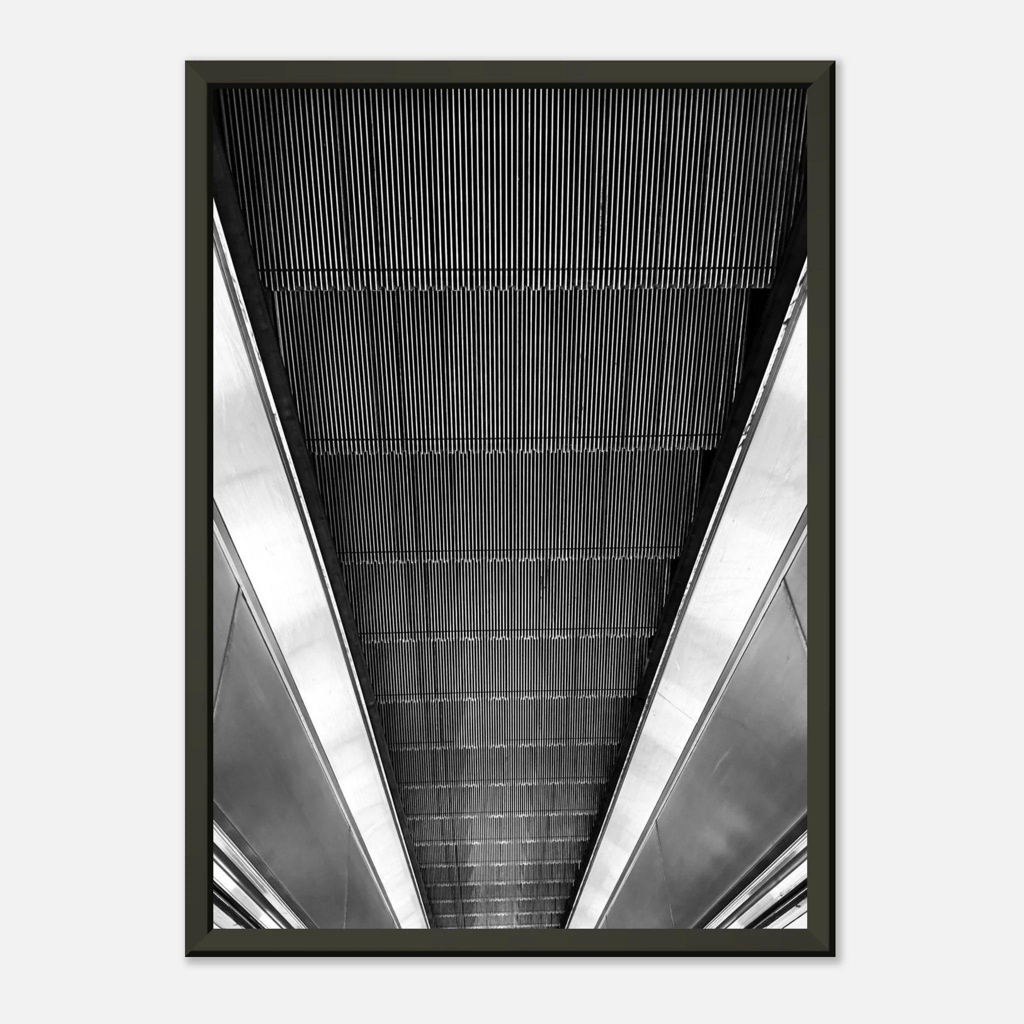 Black and white framed print of London Tube escalator abstract design from the Studio Edition Travel Collection.