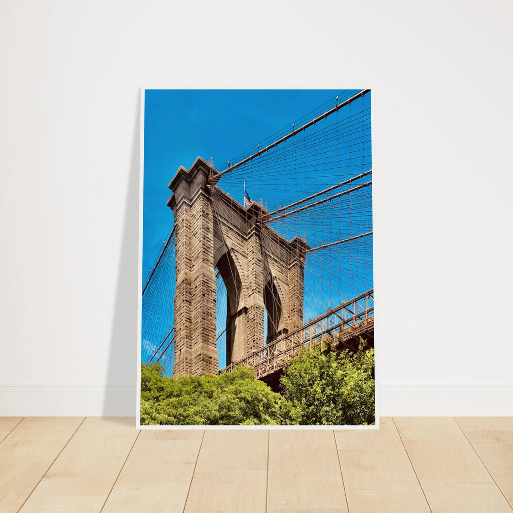Framed NYC Brooklyn Bridge poster featuring a Dumbo view, showcasing a vibrant summer travel scene with detailed print material.