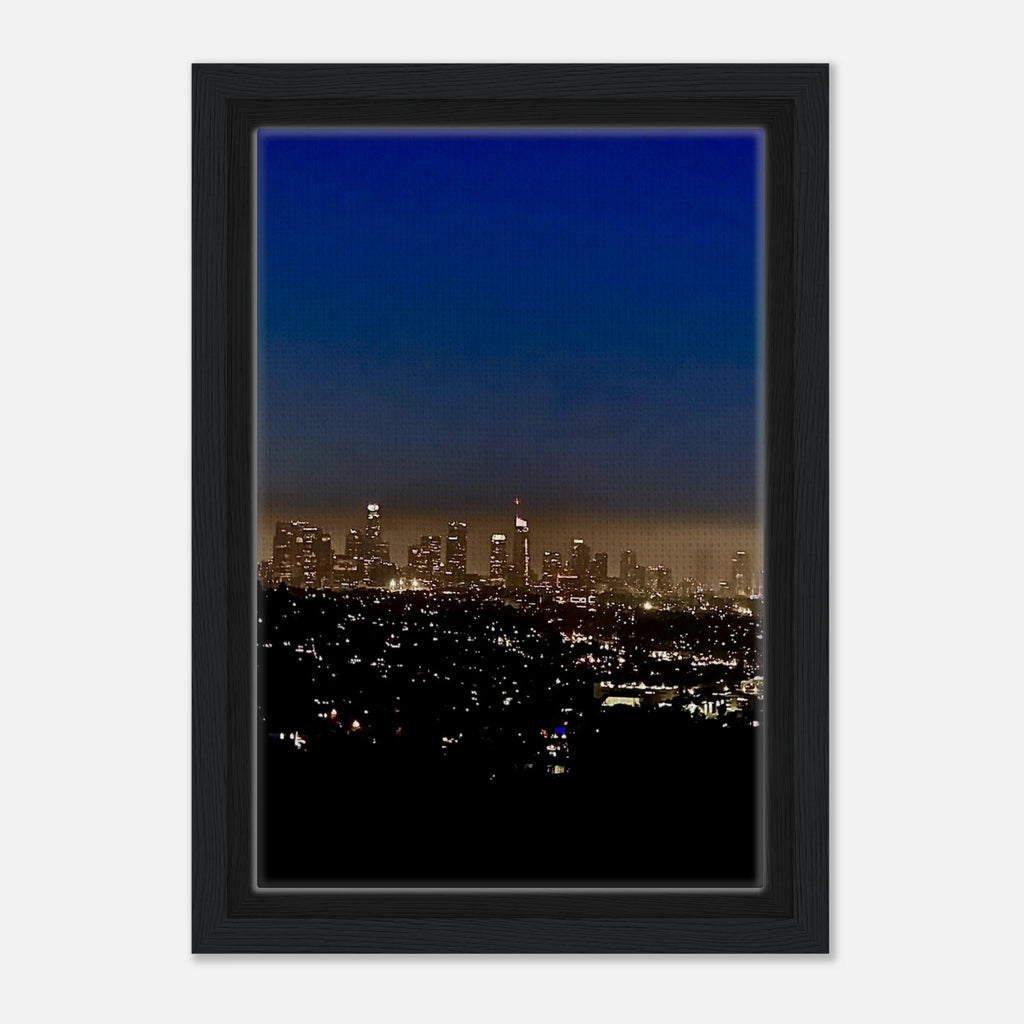 Premium wooden framed canvas print of Los Angeles Downtown Nightglow, featuring vibrant city lights for elegant home wall decor.