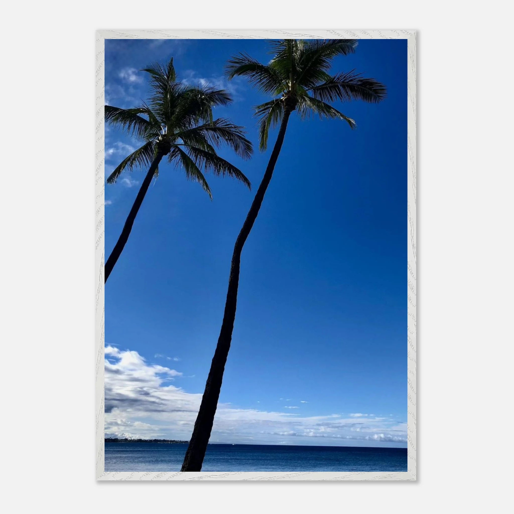 Framed print of Hawaii iconic palm tree twins and Pacific waves, from CaliCuration's travel collection studio edition.