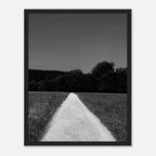 Black and white framed poster of a summer road scene from the Travel Collection, showcasing timeless travel-inspired art.