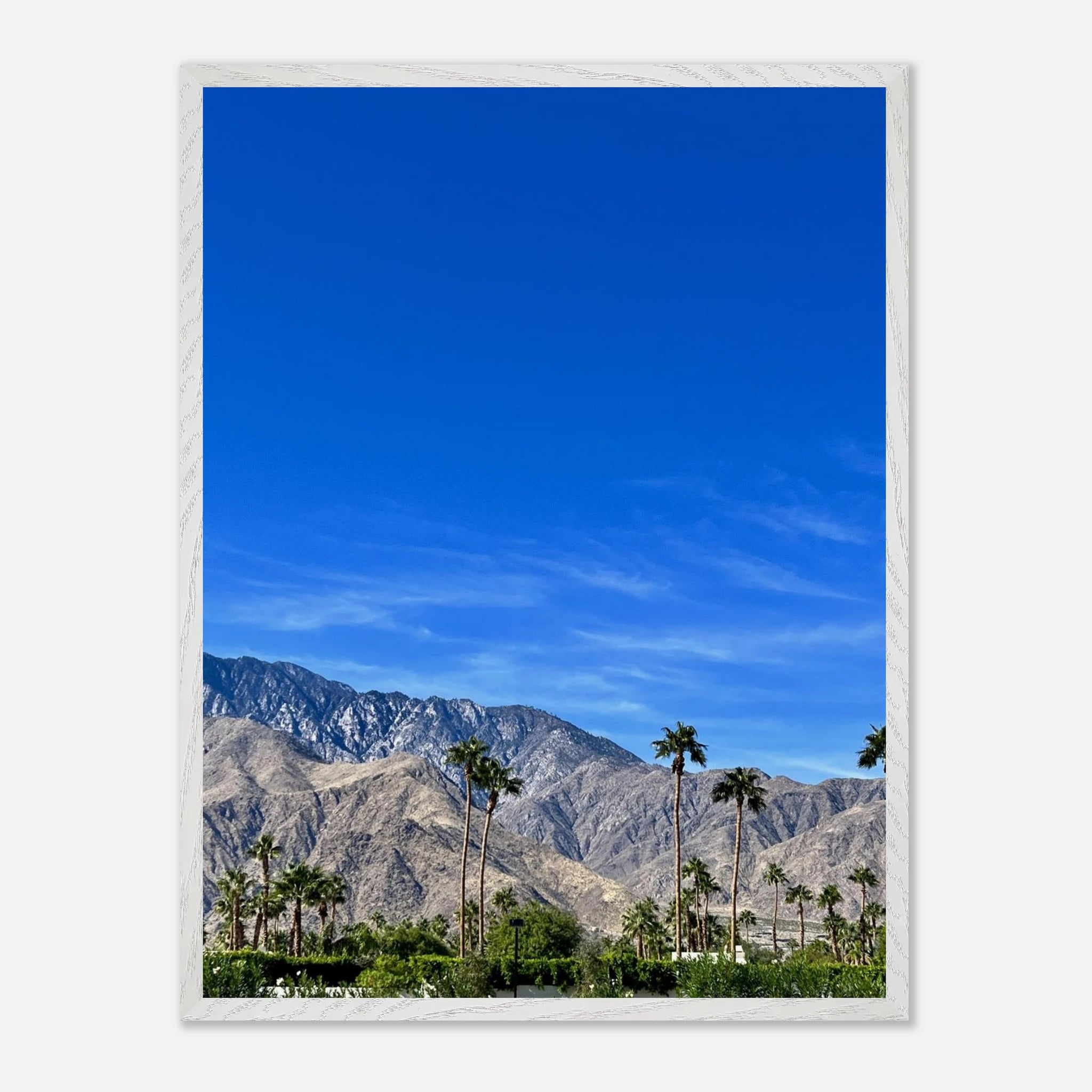 Premium wooden framed poster featuring a sunny fall day in Palm Springs California, showcasing vibrant autumn landscape art.