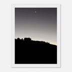 Black and white print of a wooden framed semi-glossy poster featuring a fall moon over Hollywood Hills, California art studio edition.
