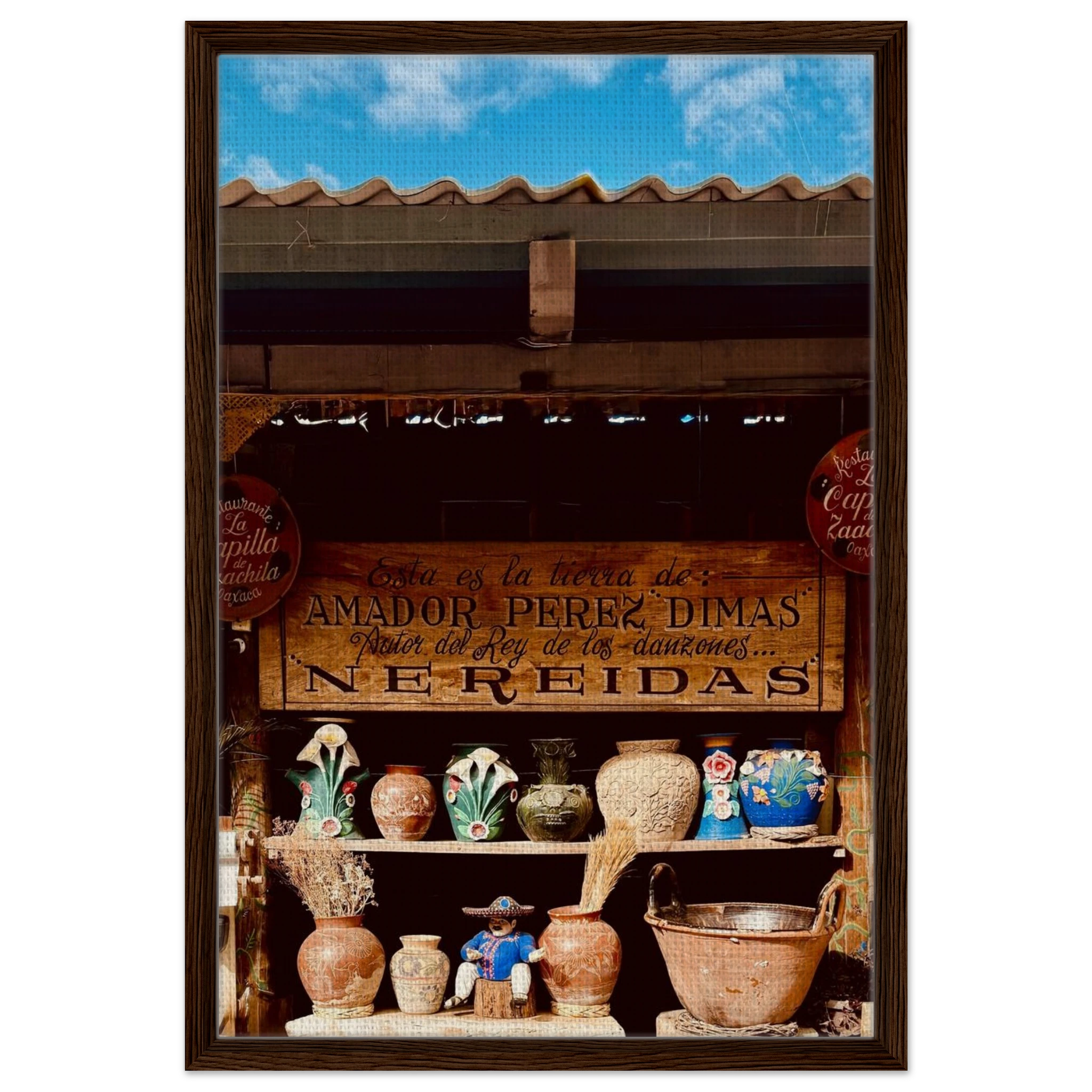 Framed canvas artwork of Oaxaca street fair scene from CaliCuration's Mexico travel collection, Studio Edition Spring 2026.