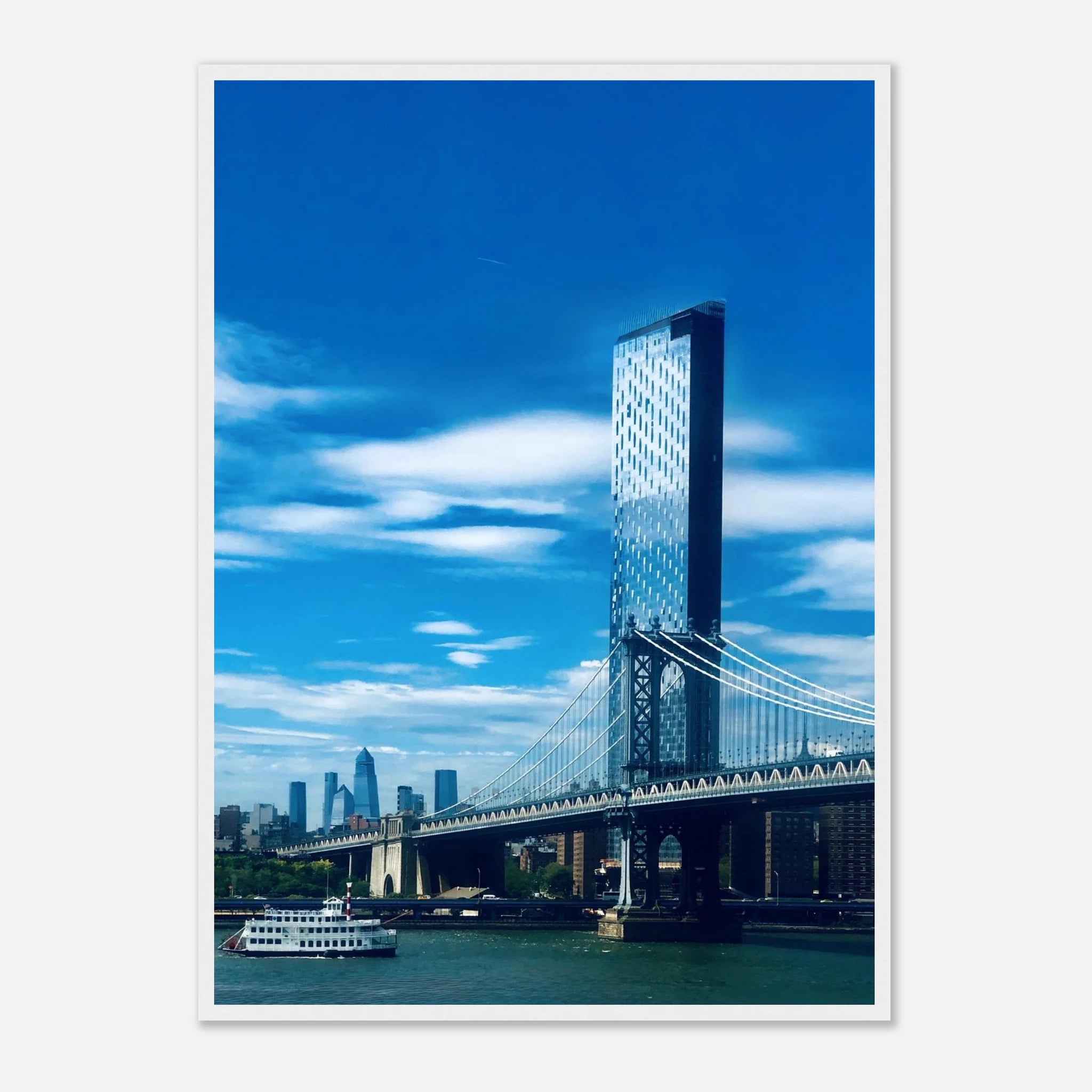 Framed NYC Manhattan Bridge and East River urban photography print, showcasing iconic cityscape and vibrant bridge details.