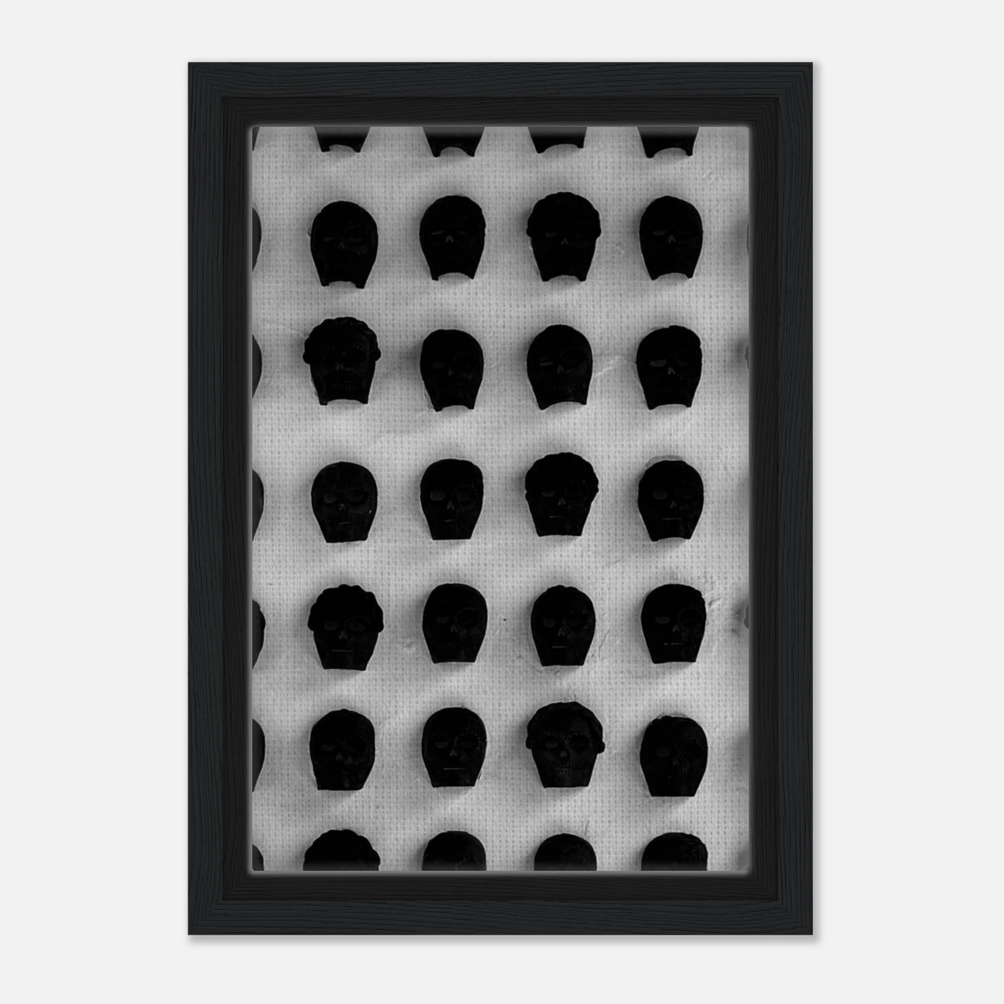 Black and white monochrome skull grid canvas wall art featuring minimalist abstract skull design in a modern travel collection print.