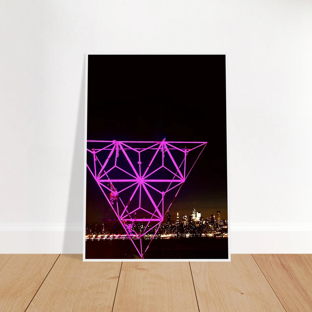 Framed print of New York City holiday art installation featuring a nighttime Manhattan skyline with Empire State Building, in purple tones.