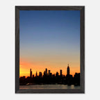 Manhattan skyline sunset framed poster featuring NYC cityscape wall art with vibrant colors and modern print material from My Store.