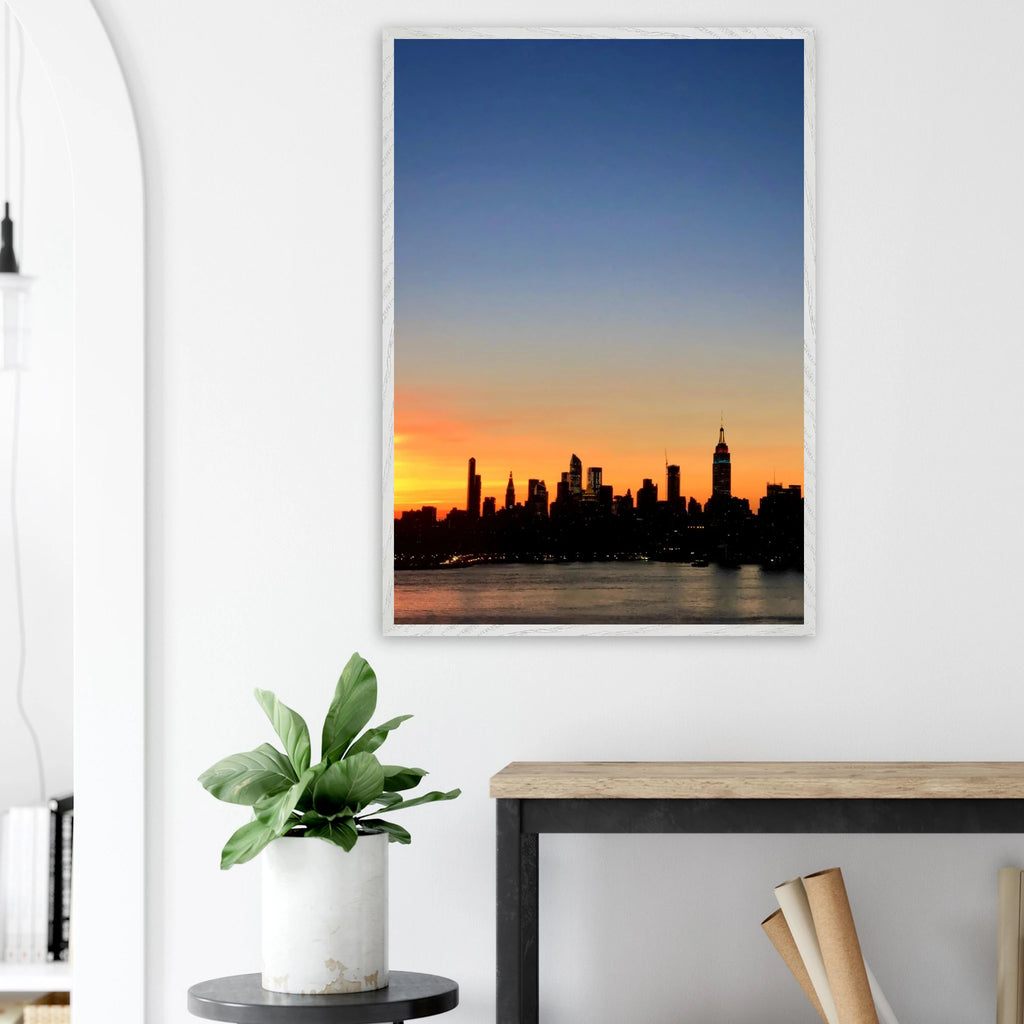 Manhattan skyline sunset framed poster featuring NYC wall art print on high-quality material, displaying vibrant cityscape at dusk.