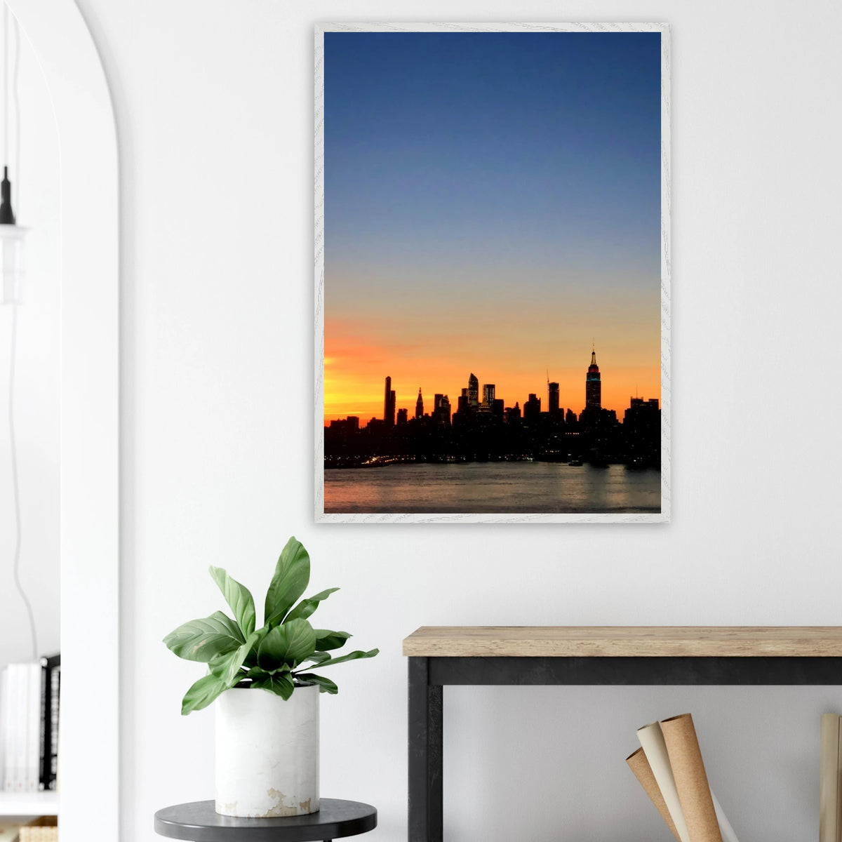 Manhattan skyline sunset framed poster featuring NYC wall art print on high-quality material, displaying vibrant cityscape at dusk.