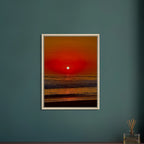 Framed canvas print of California Red Sunset Series 2/3 by CaliCuration, showcasing vibrant red sunset hues in a studio edition.
