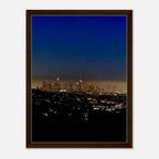 Elegant wooden framed canvas print of Los Angeles Downtown Nightglow, showcasing vibrant city lights and skyline in a studio edition.