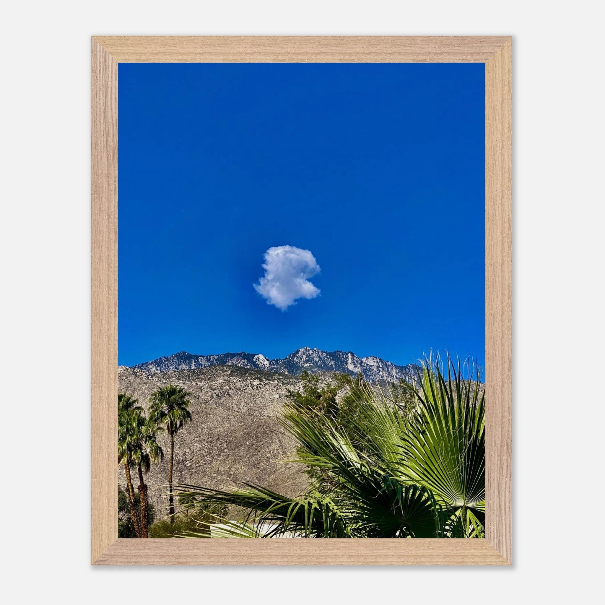 Palm Springs Cloud mounted wooden framed poster showcasing vibrant California art in a stylish home decor setting.