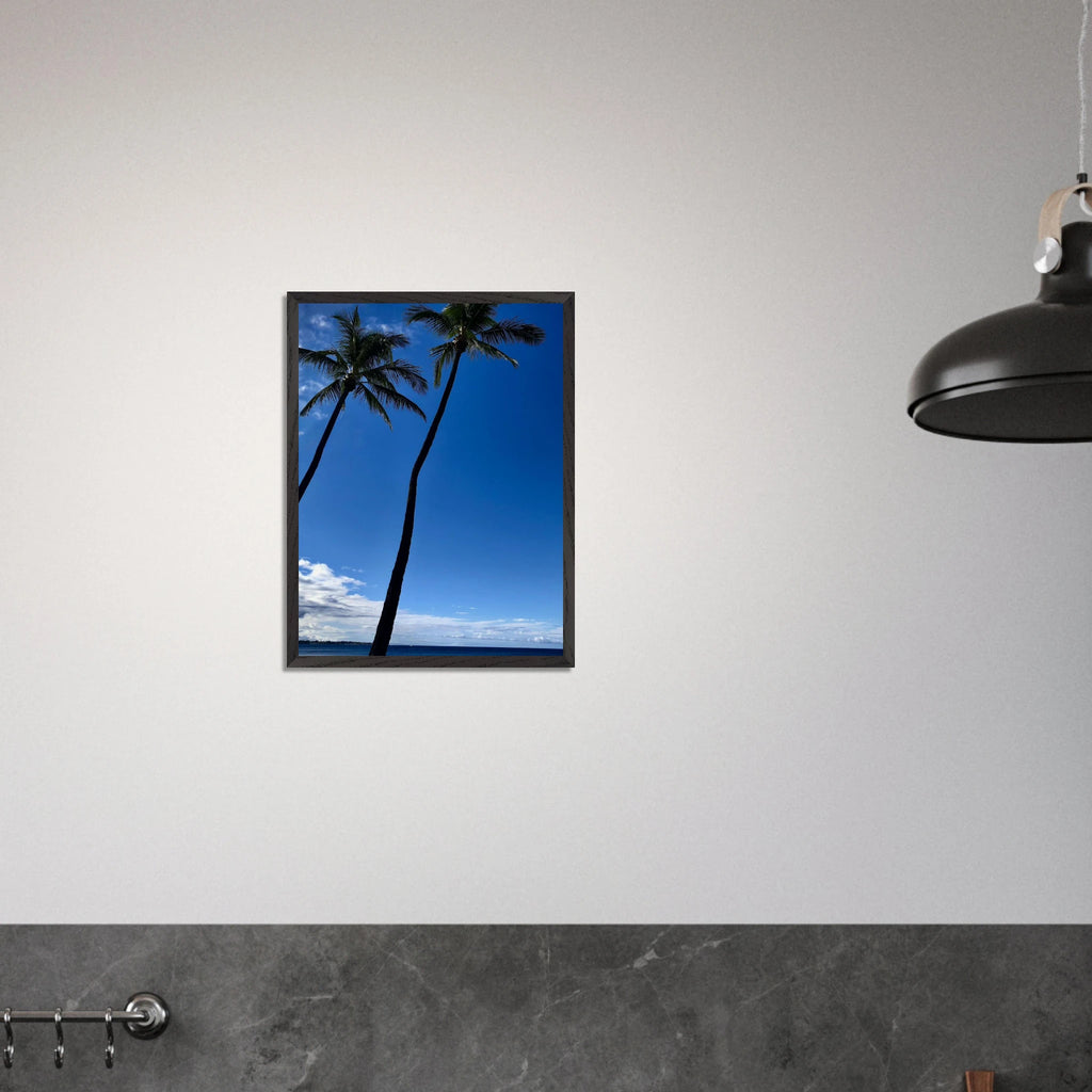 Framed Hawaii travel print featuring iconic palm tree twins and Pacific waves by CaliCuration, perfect for tropical decor.