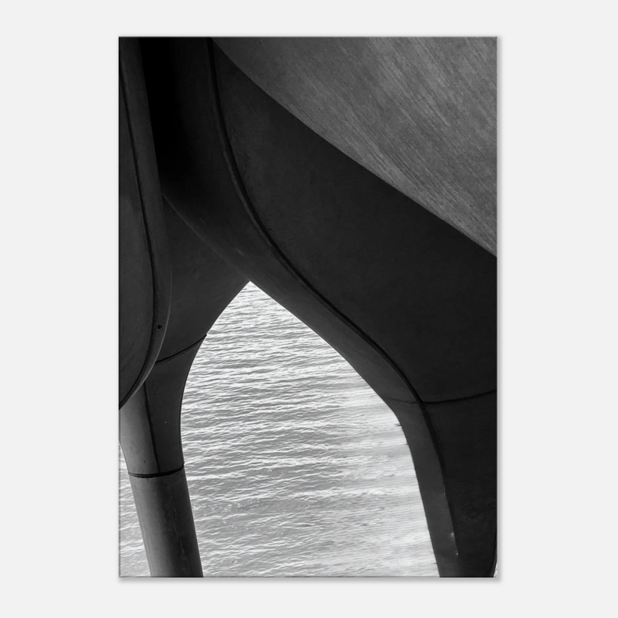 Black and white abstract canvas print of NYC Hudson River pier with high heels in water, part of Studio Edition travel art collection.