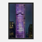 Framed canvas print of NYC holiday skyline in purple hues from the Travel Collection, Studio Edition, showcasing vibrant cityscape art.