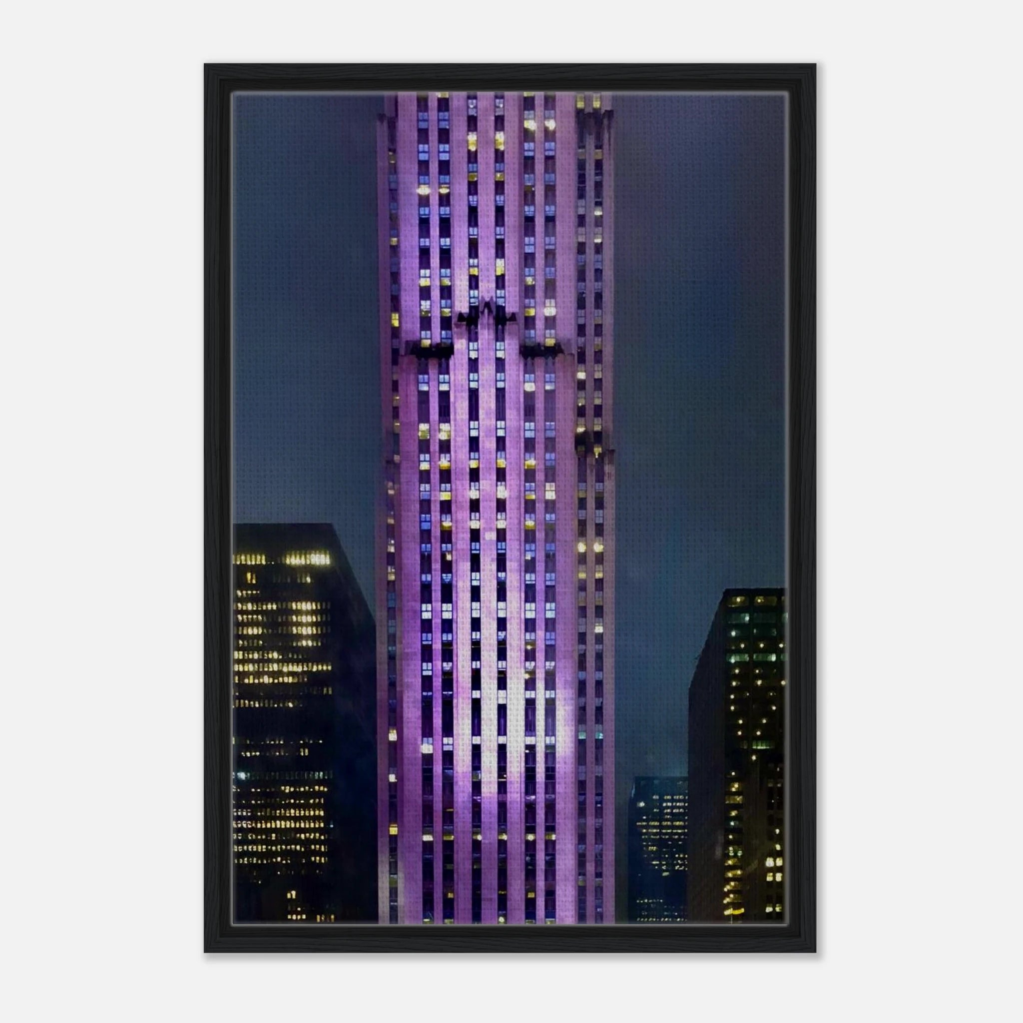 Framed canvas print of NYC holiday skyline in purple hues from the Travel Collection, Studio Edition, showcasing vibrant cityscape art.