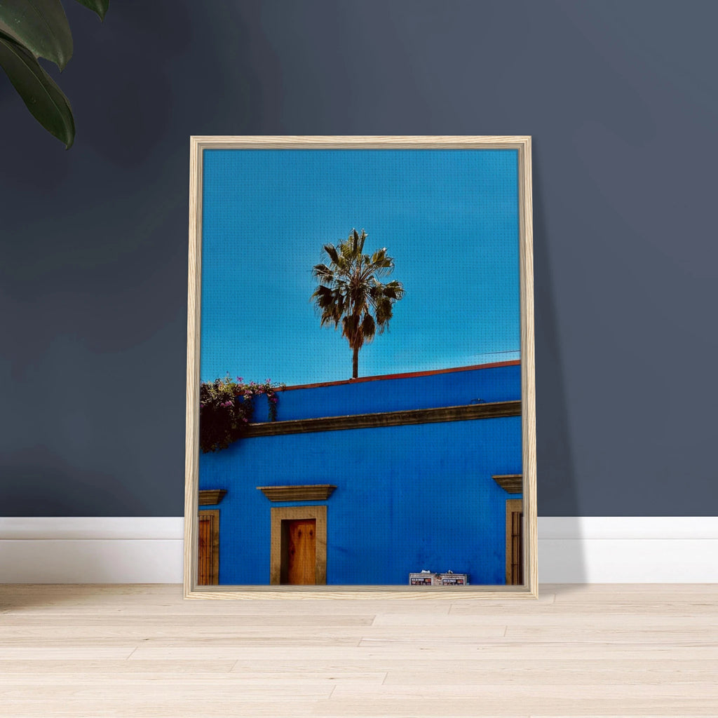 Canvas artwork print of Oaxaca streets with palm trees, framed in blue, from CaliCuration's Mexico travel collection.