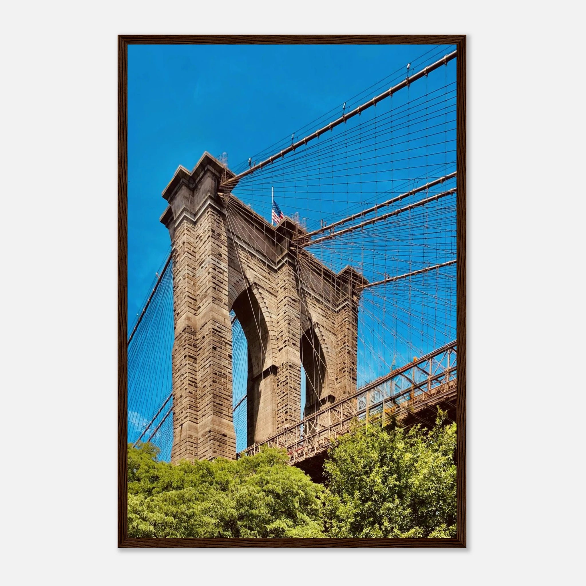Framed NYC Brooklyn Bridge poster featuring a Dumbo view, showcasing the iconic bridge and Manhattan skyline in vibrant print.