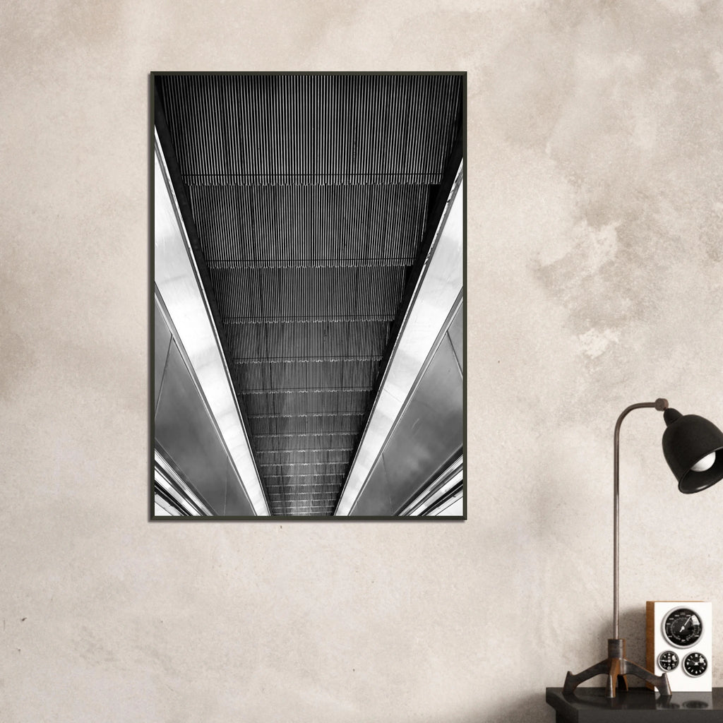 Black and white framed poster of the London Tube escalator, part of the Travel Collection Studio Edition print series.