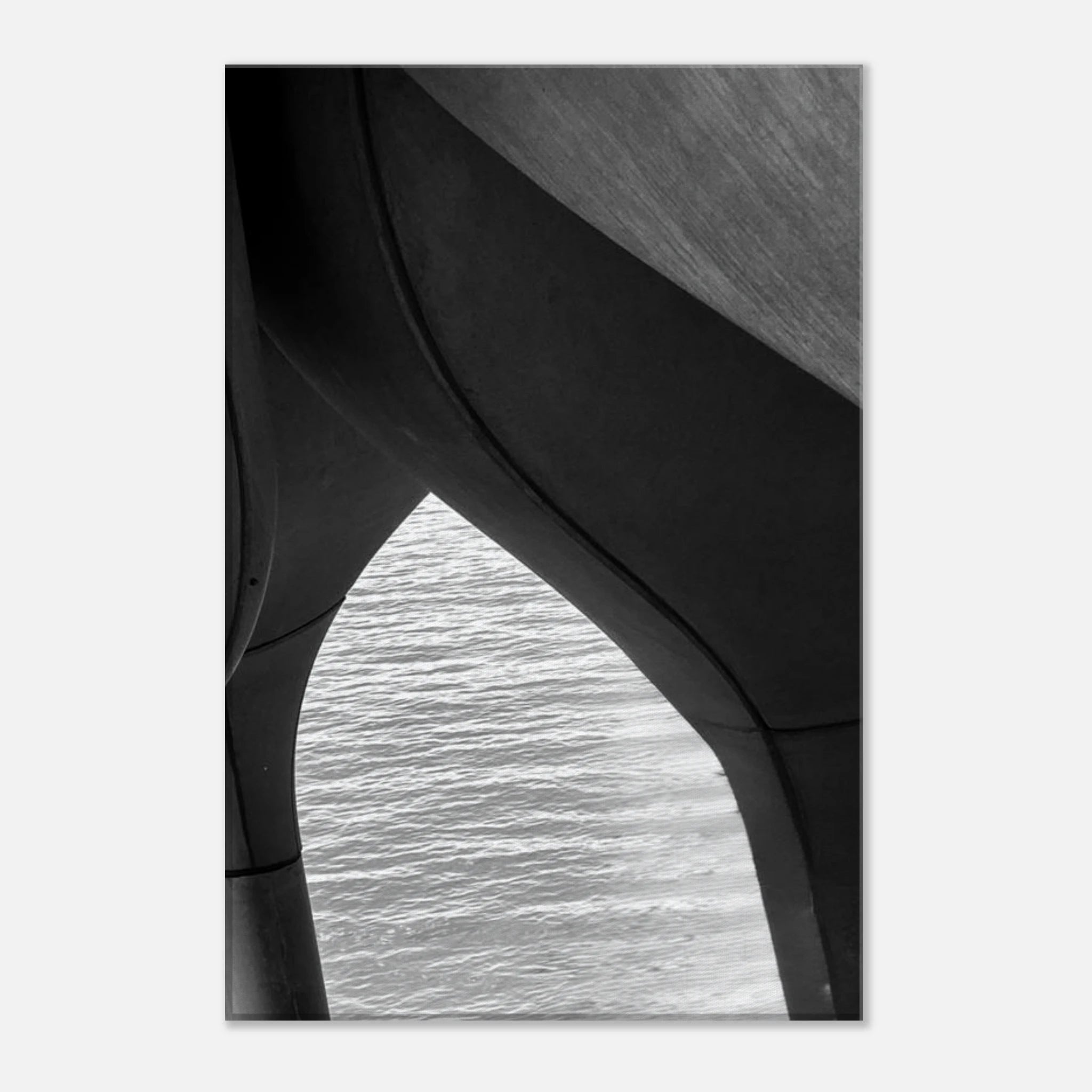 Black and white abstract canvas print of NYC Hudson River Pier with high heels in water, from the Studio Edition Travel Collection.