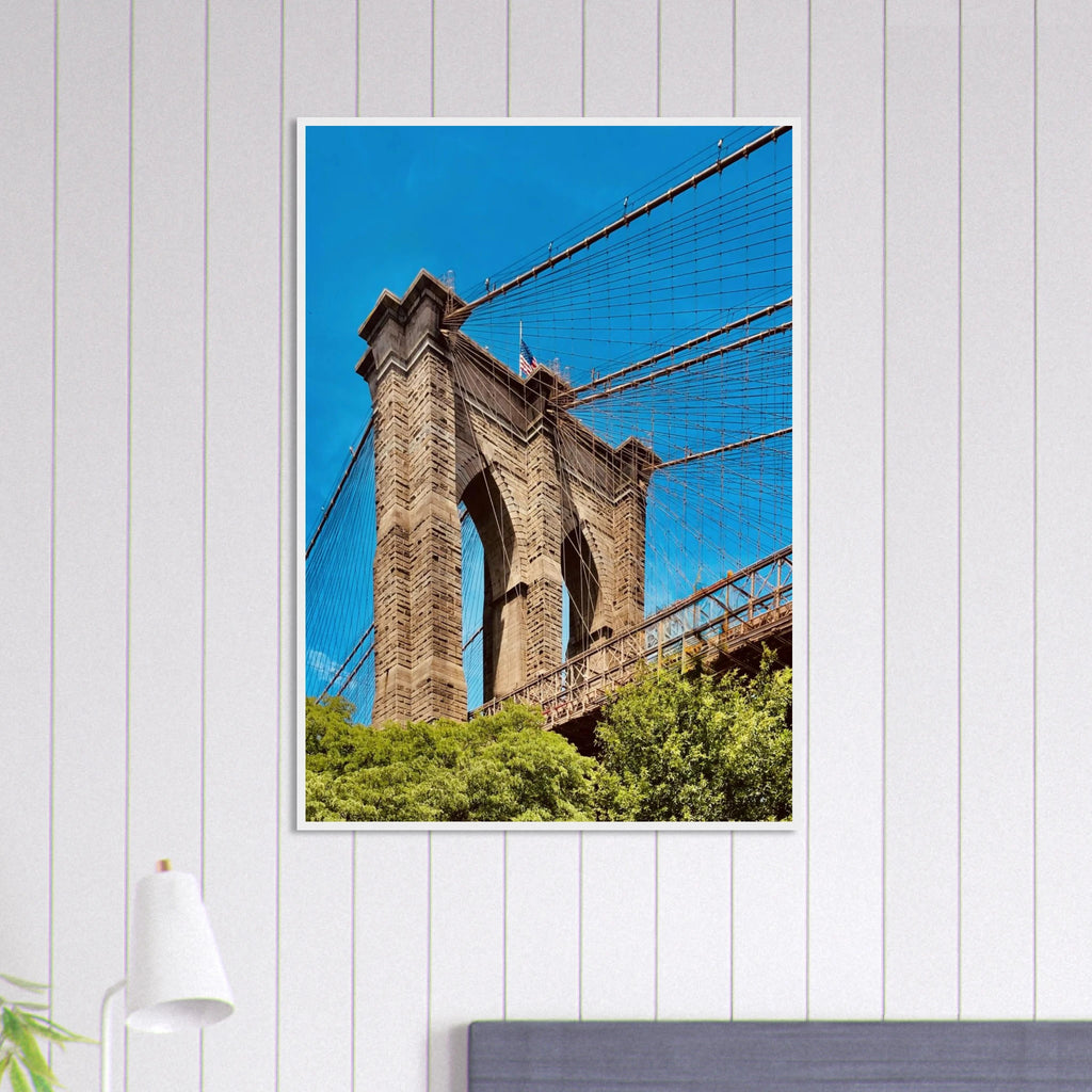 Framed NYC Brooklyn Bridge poster featuring a Dumbo view, showcasing iconic New York City scenery in vibrant print material.