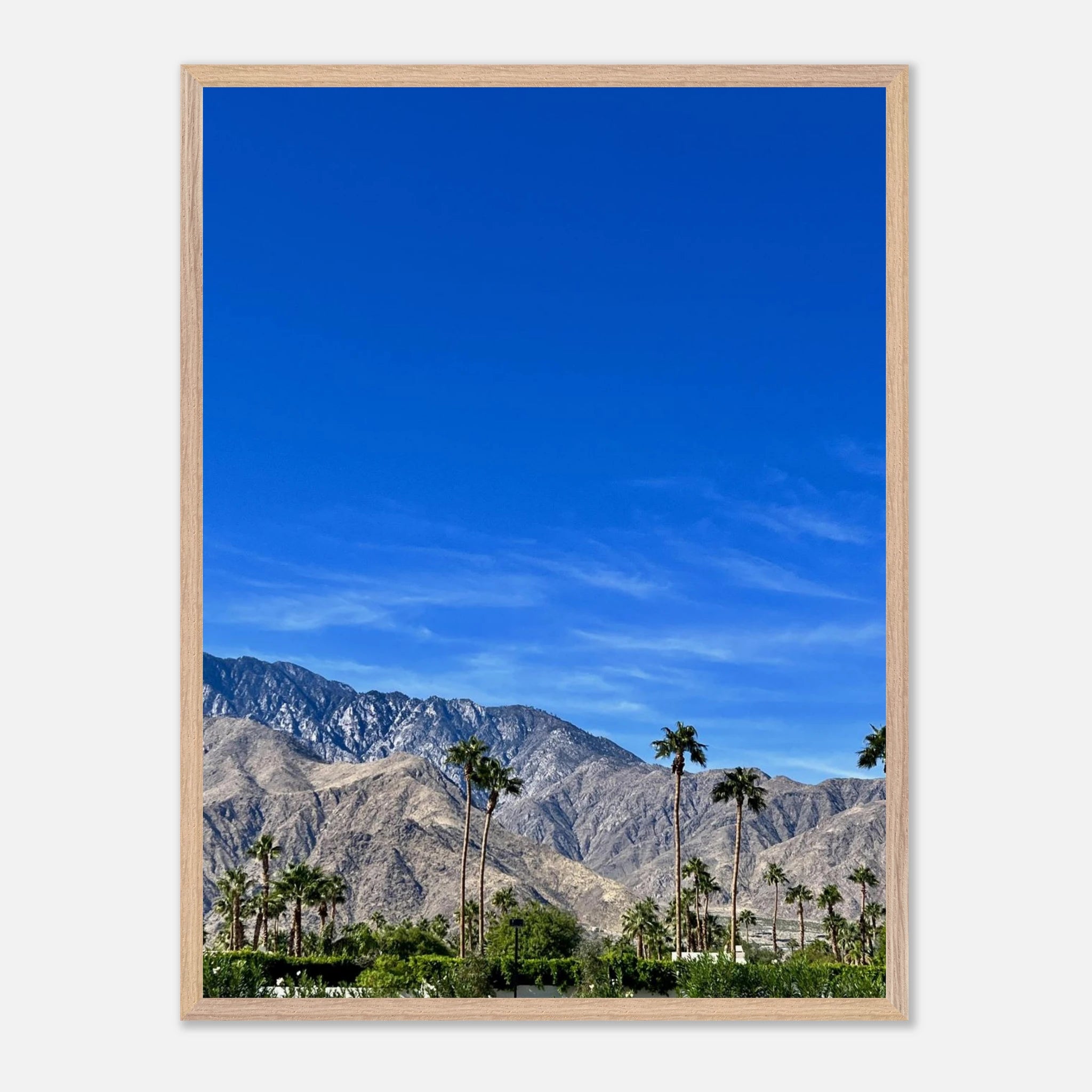 Premium wooden framed poster of a sunny fall day in Palm Springs California, featuring vibrant colors and scenic landscape art.